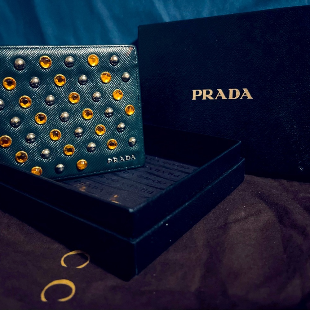 Mens [Green] Prada wallet  w/ clear & orange rhinestones. Very good condition.